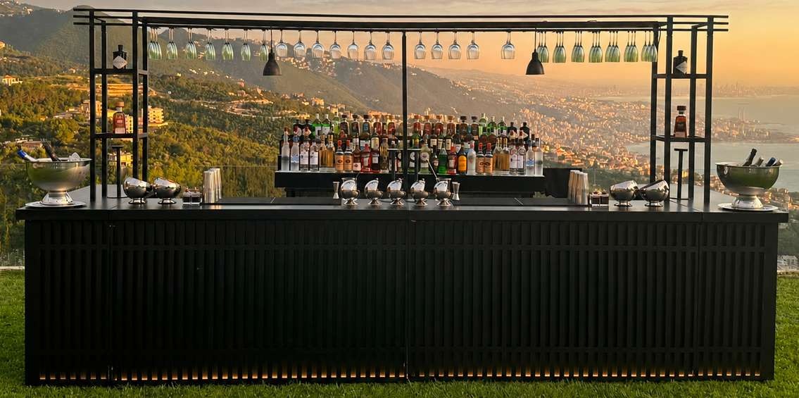 Titan architectural black bar overlooking the coast